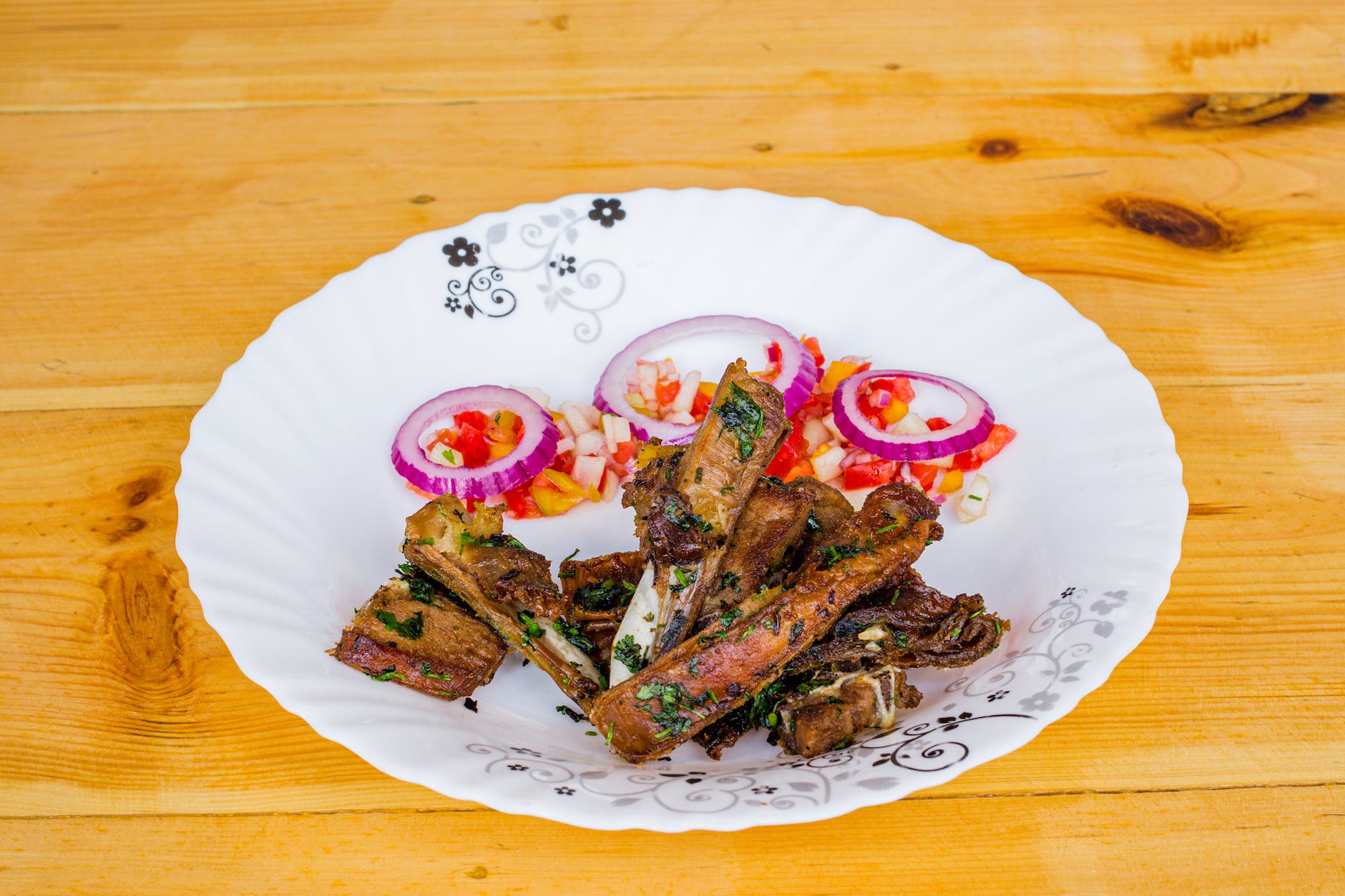 a plate of delicious ribs