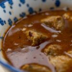 a stew dish in macro shot photography