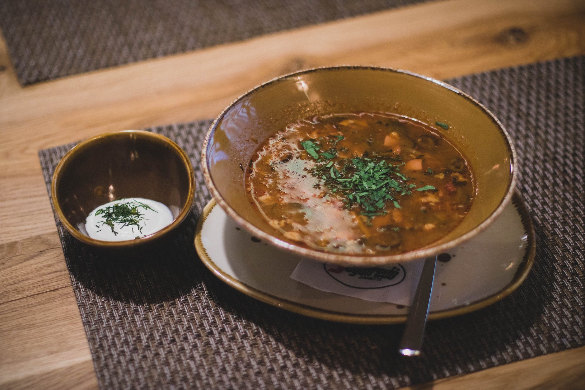 brown ceramic bowl with brown soup