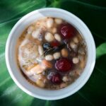 close up photo of a bowl of soup with beans