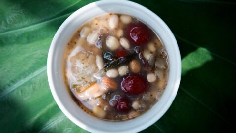 close up photo of a bowl of soup with beans