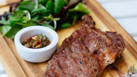 shallow focus photography of meat dish and leaves