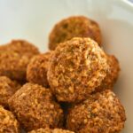 breaded shrimps in rice balls in close up photography