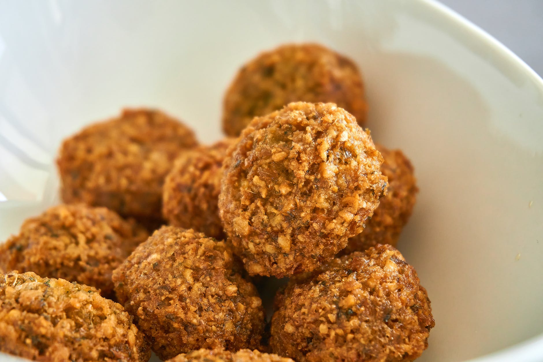 breaded shrimps in rice balls in close up photography