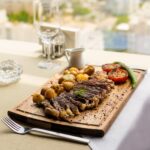 rib eye steak on a wooden board